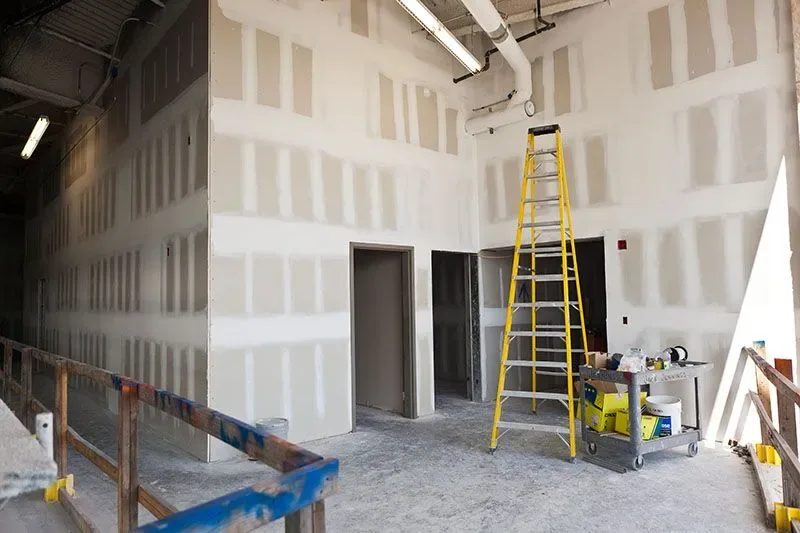 Taped and finished drywall walls in a commercial tenant build-out