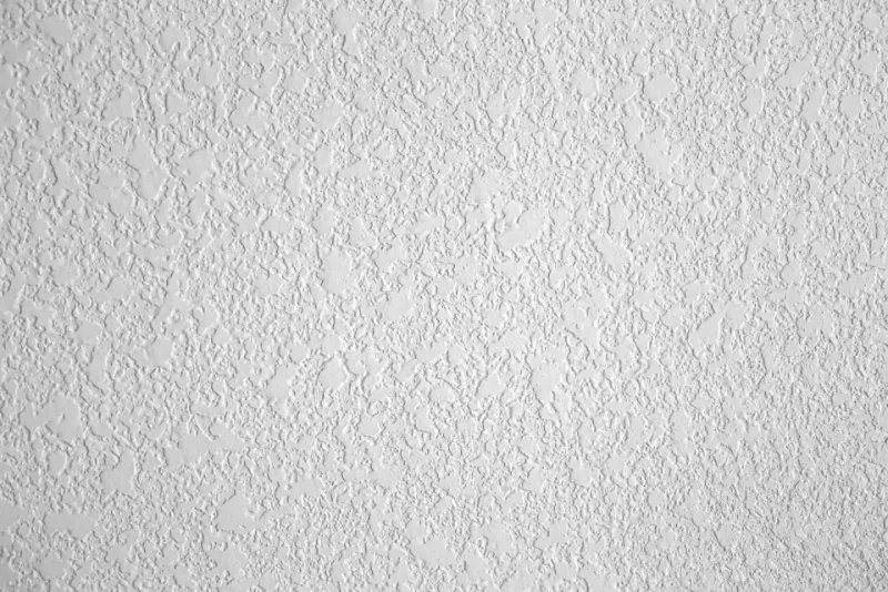 Orange peel texture sprayed across a finished wall